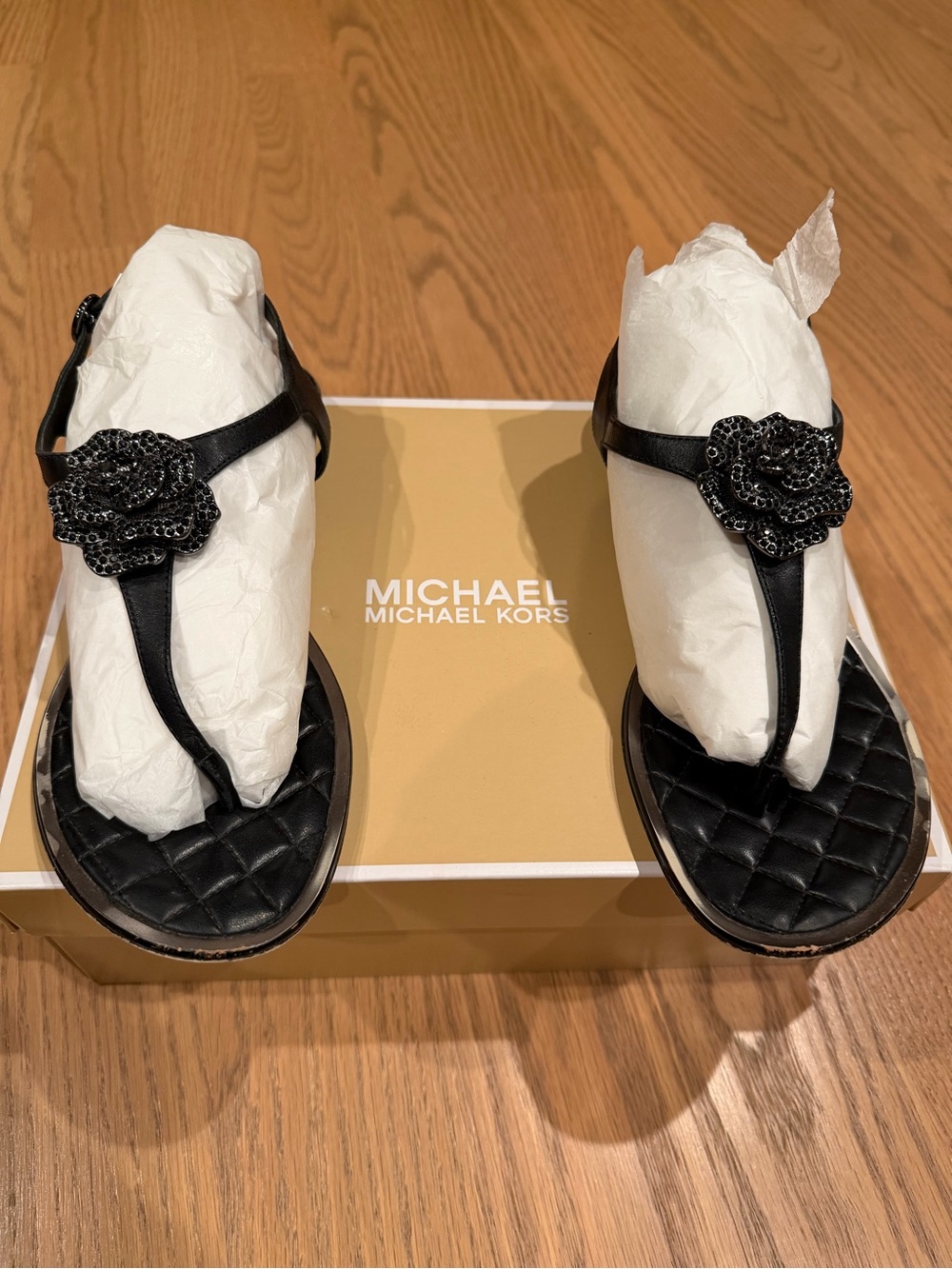 MICHAEL Michael Kors Black Quilted T-Strap Sandals with Beaded Floral Applique